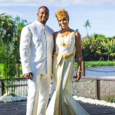 Gillian Iliana Waters and her husband, Michael Jai White posing for a photoshoot in a wedding dress.